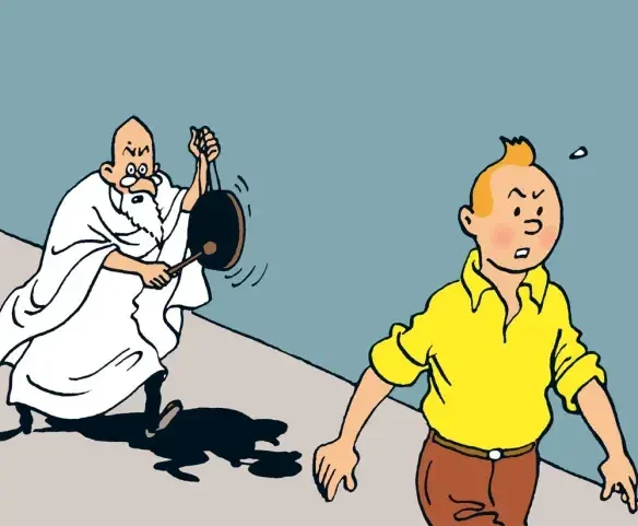 The robed prophet of Tintin & the Star following a worried Tintin with a gong