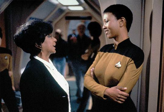 In 1993, Mae Jemison appeared as Lieutenant Palmer in "Second Chances", an episode of the science fiction television series Star Trek: The Next Generation, becoming the first real-life astronaut to appear on Star Trek. 
Shown here with Nichel Nichols https://en.wikipedia.org/wiki/Mae_Jemison