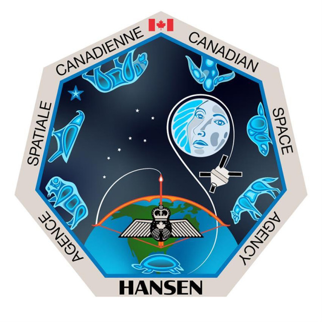 An image of an astronaut's mission patch. It is a heptagon (seven sides), whose outer boundary is silver and reads clockwise:
🇨🇦 - Canadian Space Agency - Hansen - Agence Spatiale Canadienne

Along the inside of the heptagon is a thin blue line, and inside of that is a black background. On the inside of each edge stands an animal depicted in an Anishinaabe art style:
Buffalo, eagle, bear, bigfoot, beaver, wolf, and turtle

At the bottom behind the turtle is the earth, with a red bow drawn over the northern horizon, red arrow loaded. Mounted on the arrow are Royal Canadian Air Force wings.

The seven points of the big dipper are above the earth, pointing to the North Star between eagle and bear. To the right of the dipper is the moon, which has a matronly face painted on it.

A curved white line extends from the tip of the arrow, around the back of the earth, looping back from the bottom into space above, and making a single loop around the circumference of the moon. At the end of the line is a depiction of the Orion module.