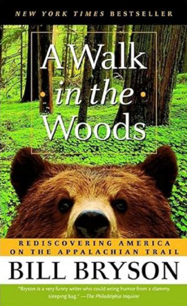 Cover for A Walk in the Woods: Rediscovering America on the Appalachian Trail by Bill Bryson

New York Times Bestseller

"Bryson is a very funny writer who could wring humor from a clammy sleeping bag." - The Philadelphia Inquirer

Cover image shows a comical closeup of a brown bear's face looking directly at the camera, with trees and plant covered woods in the background. 