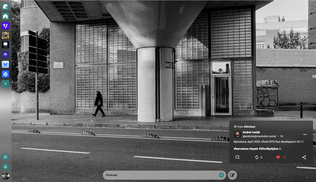 A picture from Surf Social, displaying the Image Viewer UI. 
The bulk of the page is taken up by an grey scale image of a city underpass, with in the bottom right hand corner being the post from the original uploader.