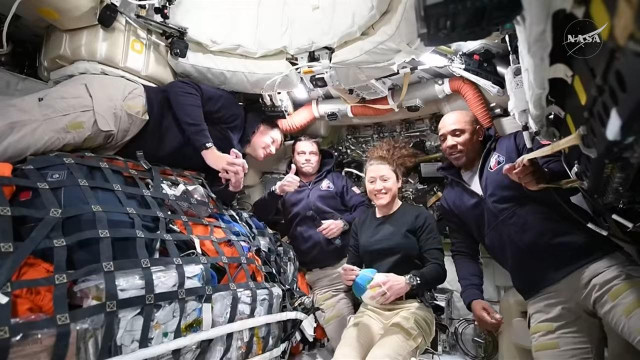 Still from webcast of live video from Orion and the 4 astronauts.