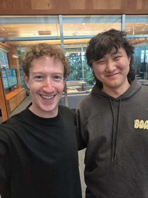 Zuckerberg and someone else photo