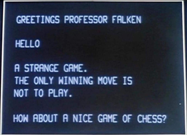  Screen with text: 
Greetings  professor Falken

Hello

A strange game.
The only winning move is not to play. 

How about a nice game of chess? 