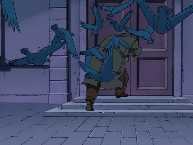 Lucas Armato (from CyberSix) runs back into the building as he's being swarmed by blue birds that attack him.