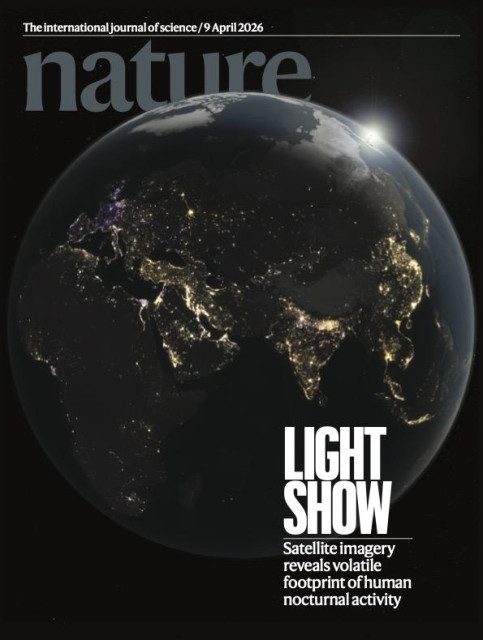This week's Nature cover: An image of the Earth at night with the words "Light Show - Satellite imagery reveals volatile footprint of human nocturnal activity"