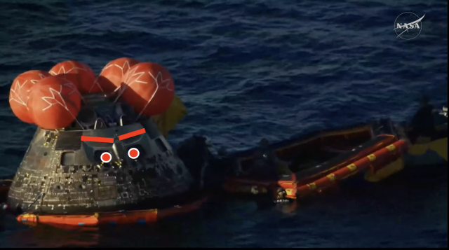 the capsule with red pupils and red eyebrows added to the two centre windows making it look angy