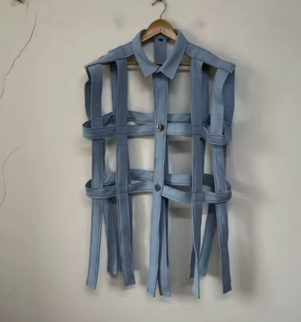 A button down shirt, but it is made of ... straps. It's full of holes. 