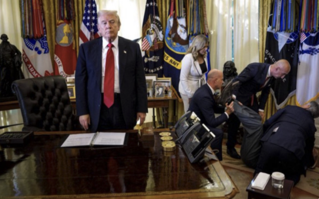 This photograph just won the award for "Excellence in Presidential News Coverage by Visual Journalists".

By Andrew Harnik of 
@GettyImages
 
It shows Donald Trump standing awkwardly staring forwards as off to his left a visitopr has collapsed and others rush to his aid. 