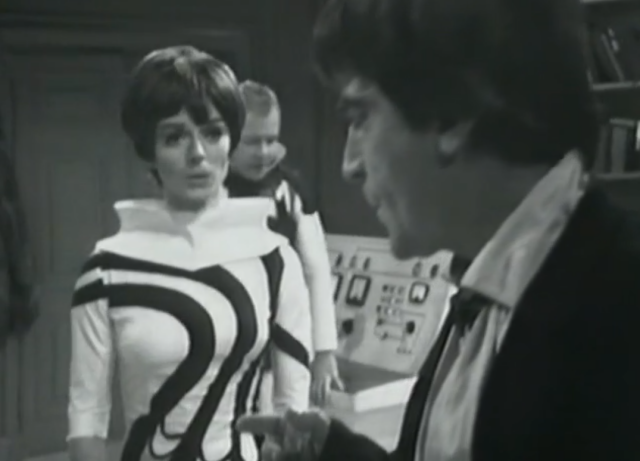 A figure covered in stripes that swirl around her body