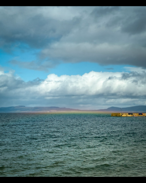 Looking due north over the Dornoch Firth from Portmahomack at 12.20 today. A flat rainbow appeared hovering over the water surface. Beautiful to see. 