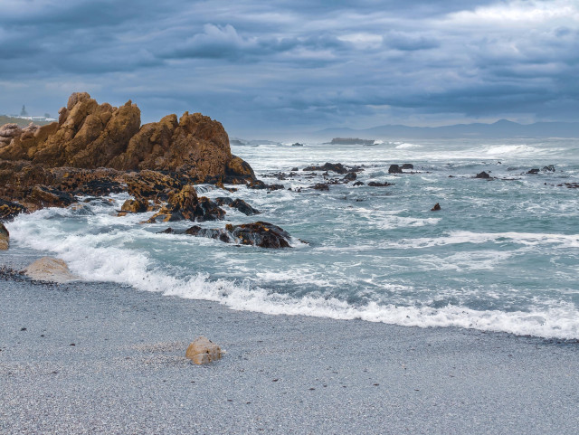 A moody beach on a cloudy day in Hermanus, South Africa.