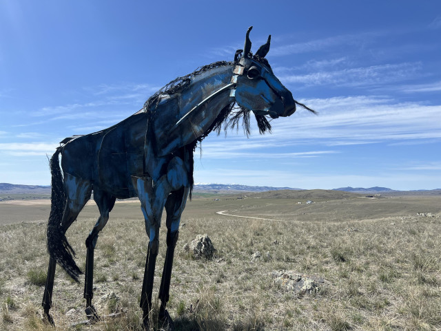 A single horse sculpture looking to the right