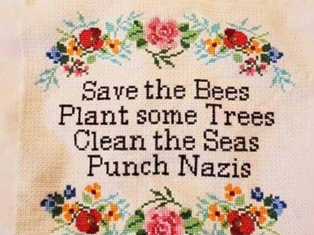 Graphic depicting a floral cross-stitch sampler with the words
Save the bees
Plant some trees
Clean the seas
Punch Nazis
