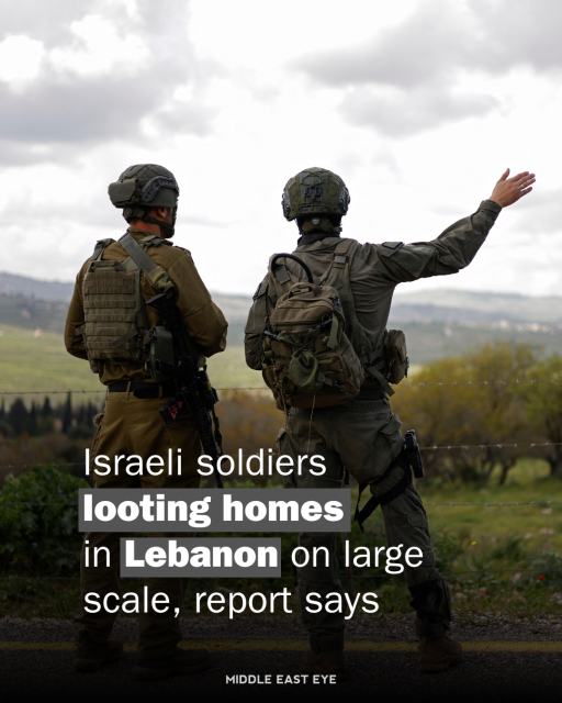 An image shows two soldiers in military gear seen from behind, looking toward a hilly landscape under an overcast sky. The soldier on the left wears a helmet, a tan tactical vest, and tan pants, and carries a rifle. The soldier on the right wears a helmet, a greyish-green tactical outfit with a backpack, and points their right arm toward the horizon. In the background is a landscape of green and brown hills, and the soldiers stand on a dark, paved surface. Overlaid text reads, "Israeli soldiers looting homes in Lebanon on large scale, report says," with "looting homes" and "Lebanon" appearing as black text on white rectangular backgrounds, and "MIDDLE EAST EYE" is written at the bottom.