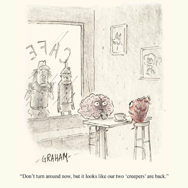 A cartoon illustration of a disembodied brain and heart sitting in a cafe while a scarecrow and tin man stare at them from the window. The heart says to the brain, "Don't turn around now, but it looks like our two 'creepers' are back."