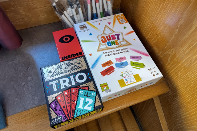 Some party games on a wooden table