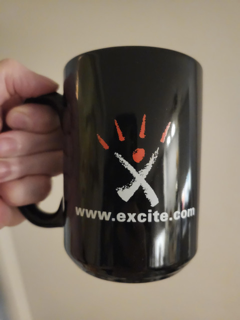 Later logo Excite.com coffee mug.