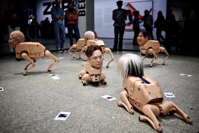 “Robot dogs with hyper-realistic silicone heads modeled after world-renowned figures — including Elon Musk, Mark Zuckerberg, Jeff Bezos, Andy Warhol and Pablo Picasso — can be seen roaming around a Berlin museum, occasionally “pooing” printed images of their surroundings which they’ve previously captured with integrated cameras.”

source https://apnews.com/article/germany-berlin-robot-dogs-beeple-bezos-digital-art-4a2be2a4a4490553ad68c27beedfe83a