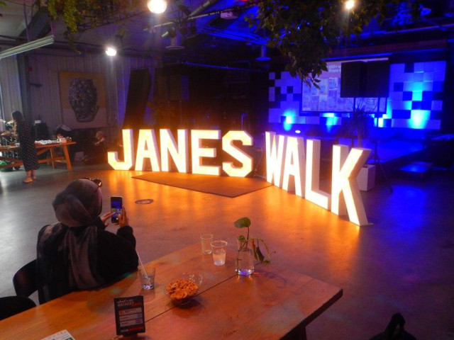 Giant Letters lit up spelling JANES WALK