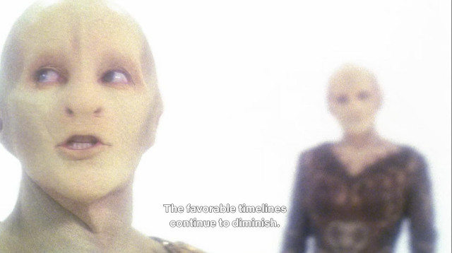 Star Trek Enterprise scene. 🎶ITS BEEN A LONG ROAD🎶
Ok, so, we're in one of those scenes where people are in a dreamlike state or maybe a liminal space between realities. Entirely white, misty foggy type backdrop, no other imagery or people or anything, just white. We see a scaley skinned flat snakey nose looking lady with no hair and some odd shaping to her noggin. (She's like a slightly reptilian humanoid alien lady) We see her in two views, soap opera style, one blurry in the background, and then her in focus face up close. Closed caption reads, "The favorable timelines continue to diminish."