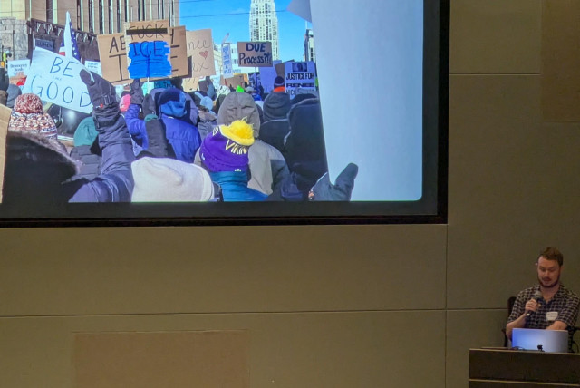 A slide during the preso showing ICE protesters demonstrating in downtown MSP