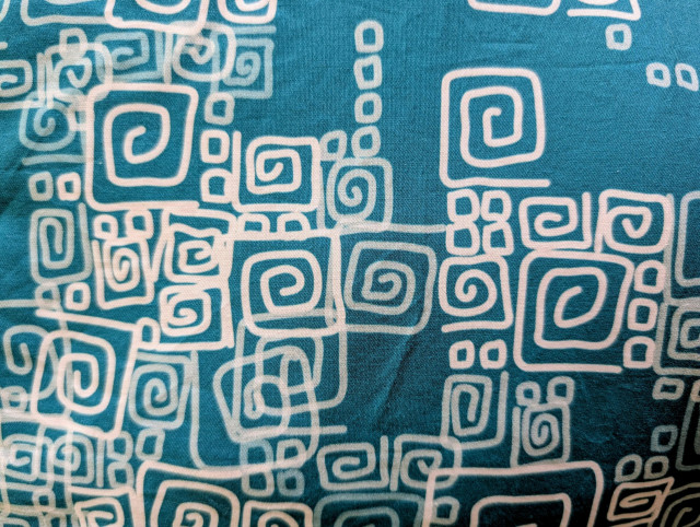 A fabric print of a boxy pattern