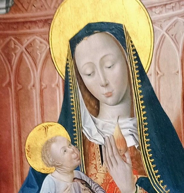Detail of a French 15th Century Virgin and Child painting in the Chicago Art Institute. The baby Jesus looks like a little old man.