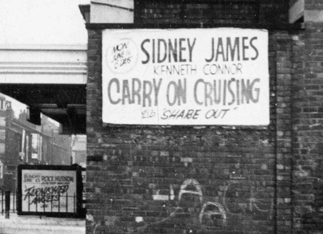 b/w street photo including film poster for: Carry on Cruising / Tarnished Angels  (close up)