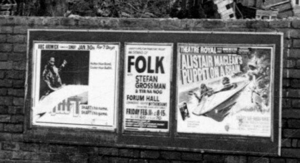 b/w street photo including film poster for: Shaft / Puppet on a Chain (close up)