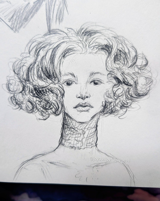 A sketchbook page with a pencil drawing of a Caucasian woman with a curly bob looking at the viewer. She has a lacy choker.