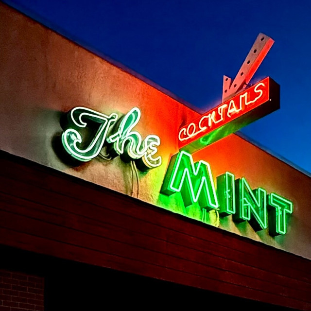 Neon sign for a cocktail lounge called The MINT