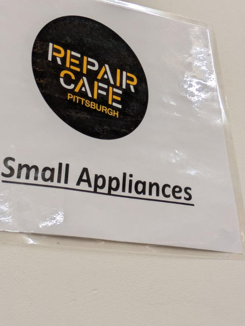 repair cafe small appliances sign