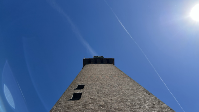 A high building in a nearby town 