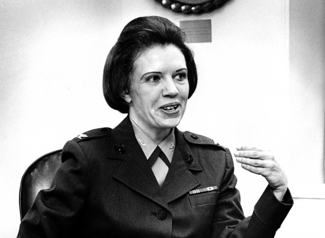 Margaret Brewer in her US Marine dress uniform. She is a white woman with dark hair.