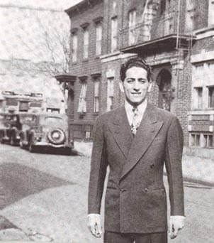Photo of a young Tony Bennett looking dapper in a fashionable suit 