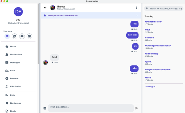 Screenshot of the Holos desktop interface showing an end-to-end encrypted conversation, with a navigation sidebar on the left and a trending hashtags panel on the right.