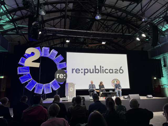 Cory Doctorow, Francesca Bria and moderator sitting on stage at re:publica 2026