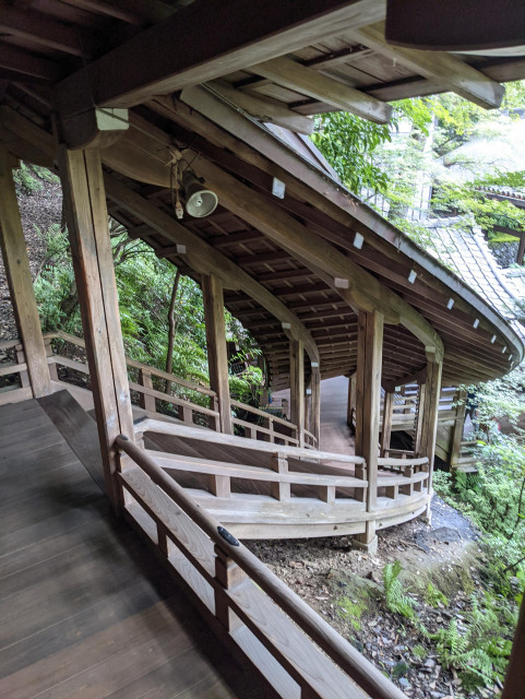The 'Reclining Dragon Corridor' curls up the mountainside from the Founder's Hall at Eikan-do like the spine of a resting dragon.