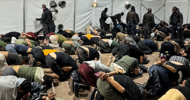 People from the “Freedom Flotilla” restrained and forced to the ground while being held under armed supervision by the Israeli occupation forces.
A scene that raises many questions about the treatment of civilian activists and international solidarity movements.