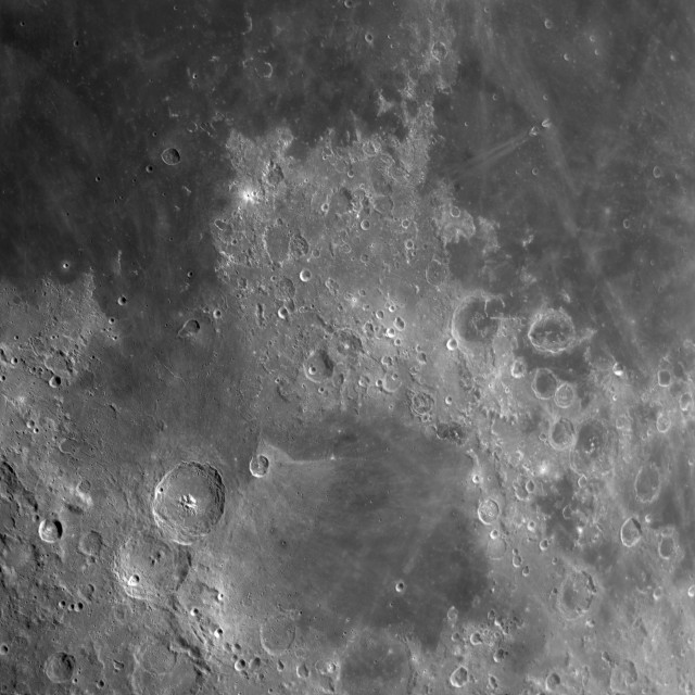 Here we see Mare Nectoris, the large plain to the southwest of Mare Fecunditatis, which itself appears towards the upper right corner. Towards the center left id the Bay of Roughness (Sinus Asperitatis) and south of it is crater Theophilus.