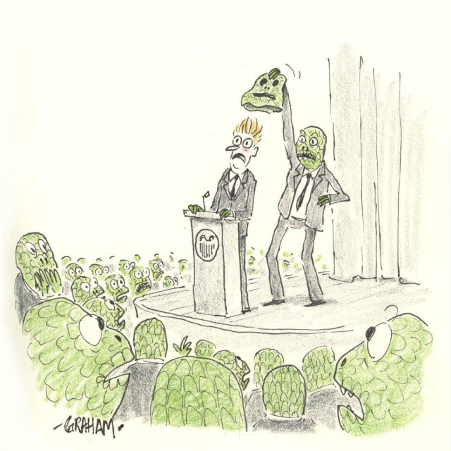 A cartoon illustration of a speaker having his reptilian mask torn off by another reptilian onstage, revealing a human man underneath, while a crowd of reptilians looked surprised.