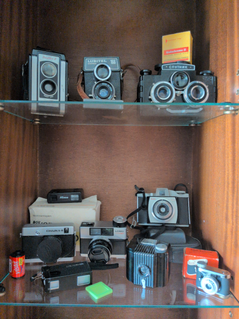 cupboard of old cameras