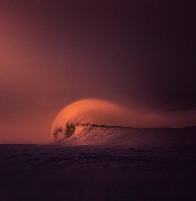 a vibrant photo of a cresting wave