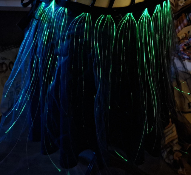 Image of a fibre optic skirt with many glowing parts