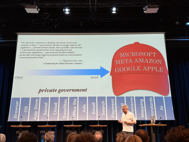 Robin in front of slide with red cap that says Microsoft Meta Amazon Google Apple