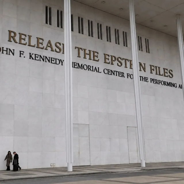 This photo is a composite - it shows the facade of the Kennedy Center in Washington DC after the removal of the name of Trump, with his name replaced by the statement - Release the Epstein Files, under which is states the accurate historical name, The John F. Kennedy Memorial Center for the Performing Arts.