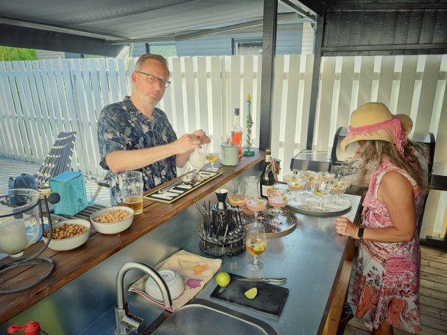 Full activity preparing drinks and snacks in the bar.