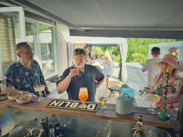 Drinks are being had in the bar.
