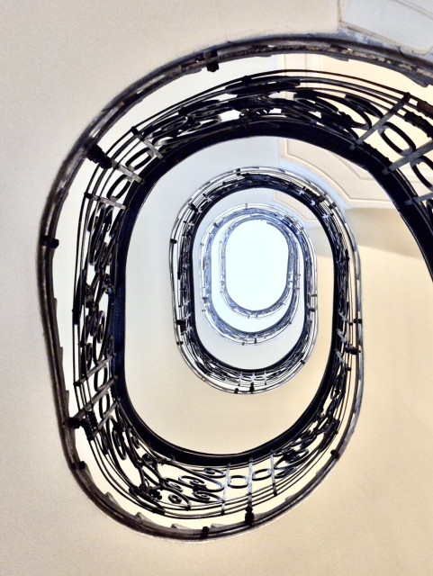 Staircase, seen from below, in an old building in josefstadt, vienna, austria
